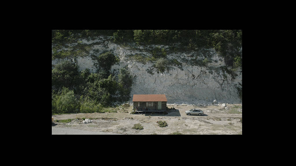 The cottage and immediate gardens were built on the site of a small quarry which provided the immediate base of the cliff and surroundings.