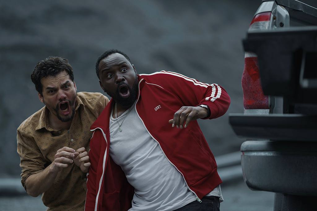 Wagner Moura and Brian Tyree Henry portray childhood friends and partners-in- crime Manny Carvalho and Driscoll. 