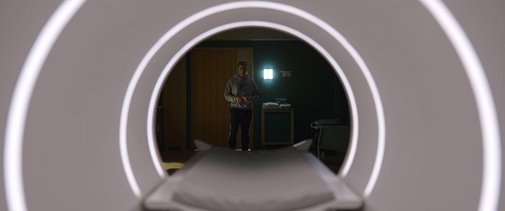 Erik survives the tattoo parlor blaze only to meet his fate in a hospital when he is crushed by a wheelchair while being pulled into an out-of-control MRI machine.