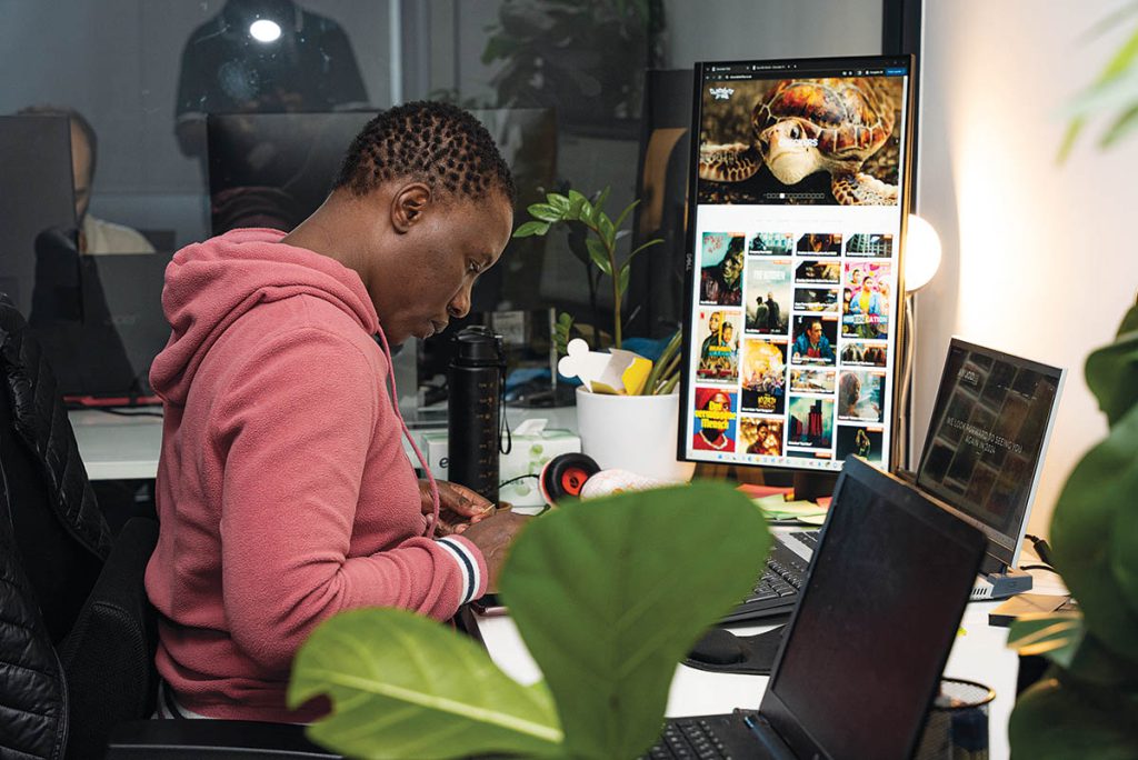 Stella Gono, Software Developer, working on the Chocolate Tribe website.