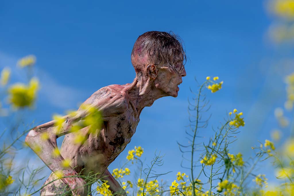 Given that the Infected are nude, visual effects needed to paint out the squibs placed on their bodies. (Photo: Miya Mizuno) 