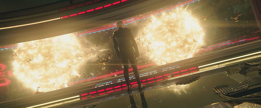 Starfleet Captain Christopher Pike (Anson Mount) views the outcome of his space battle against the Gorn from the bridge of the Enterprise.