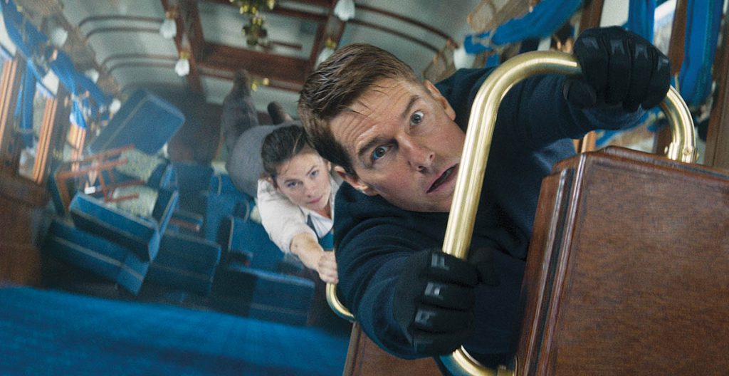 Ethan Hunt (Tom Cruise) attempts to escape a falling train in Mission: Impossible – Fallout. (Image courtesy of Paramount Pictures)