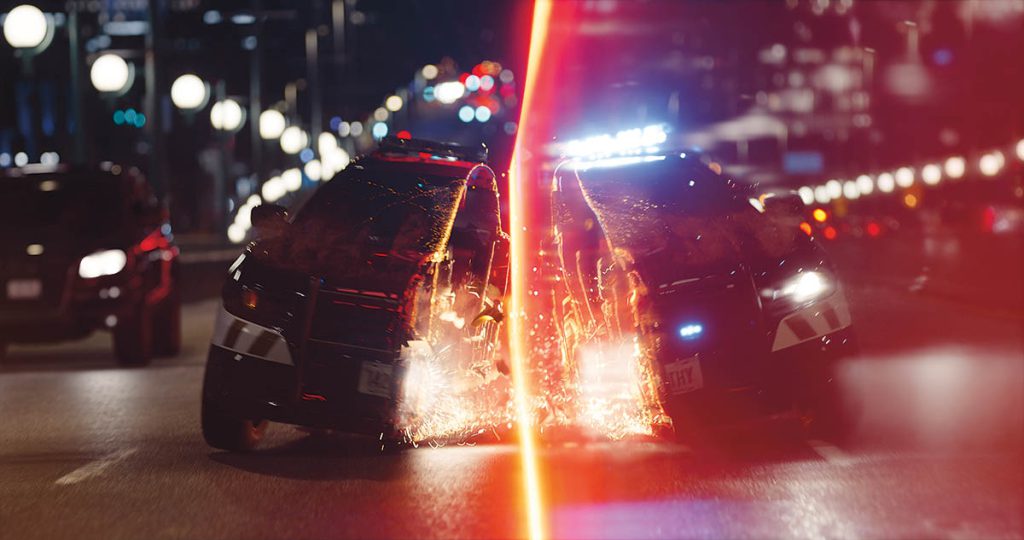 The special effects team led by Cameron Waldbauer created a practical police car that could be split in half, while the Light Ribbon was inserted later in post-production.