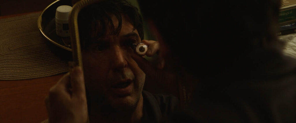 The vast majority of the dangling eye effect was achieved prosthetically. 