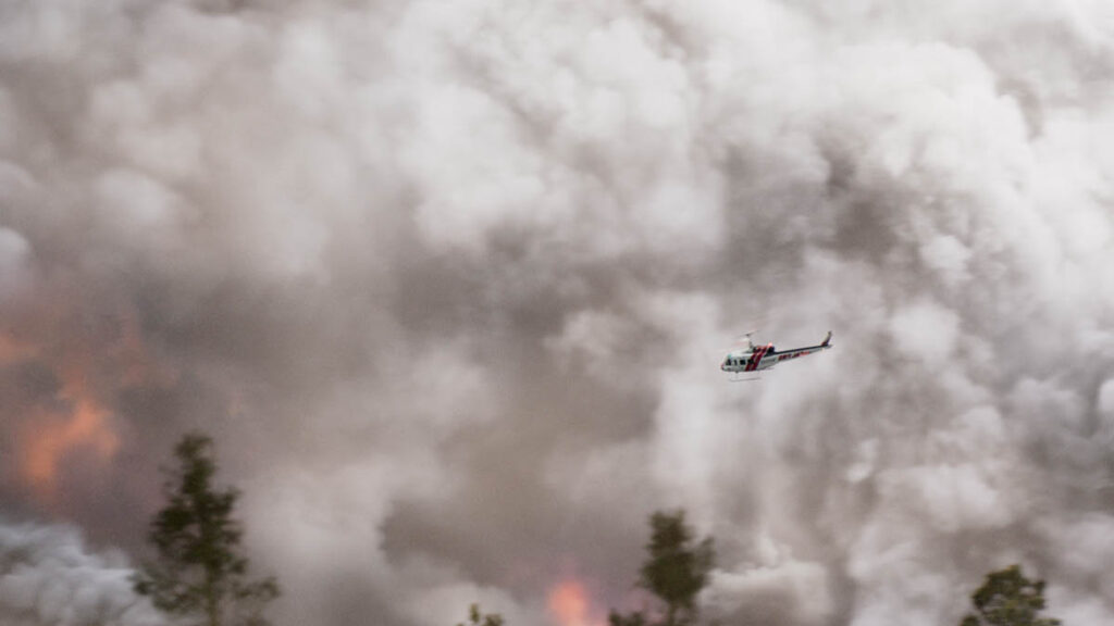 Skies had to be replaced with the smoke clouds emphasizing the massive size of the forest fire.
