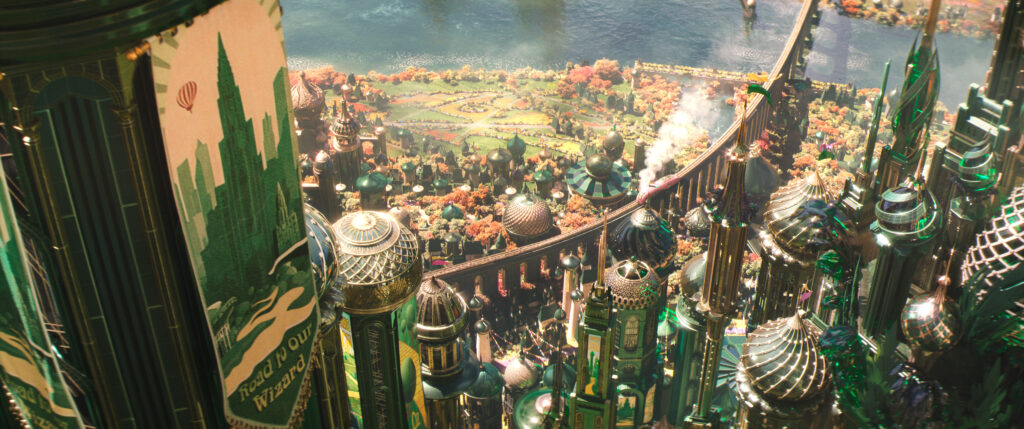 Aerial views, as well as exploring different areas of Emerald City, make it appear even more epic in Wicked: For Good.