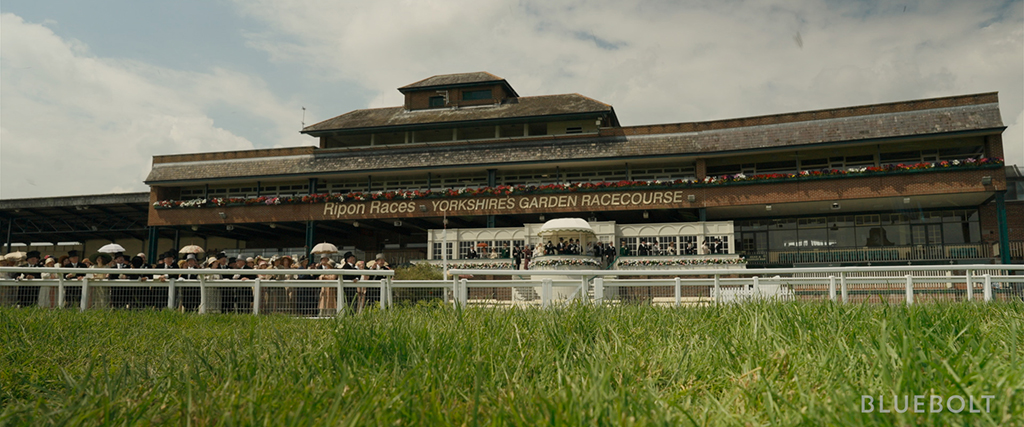 Rippon Racecourse was transformed for a scene that takes place during Royal Ascot Raceday with a CG grandstand and 2D and 3D-replicated crowds.