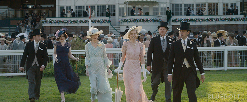 The Crawley family appear in a slow-motion shot that would make Sergio Leone smile.