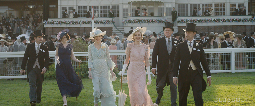 The Crawley family appear in a slow-motion shot that would make Sergio Leone smile.