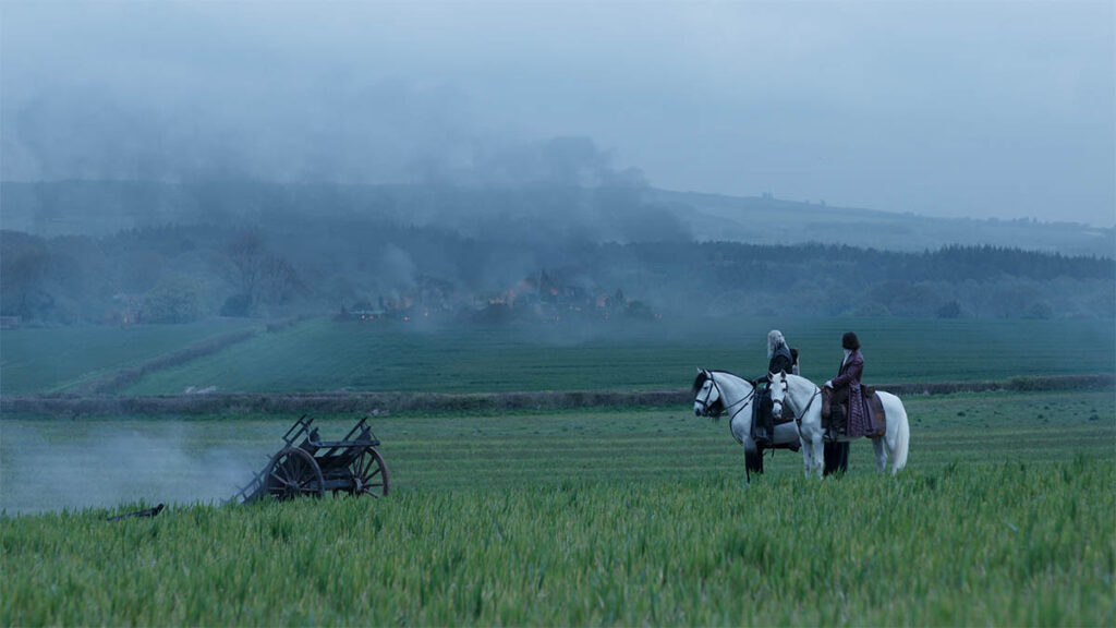 A village is digitally integrated into the mist-covered landscape.