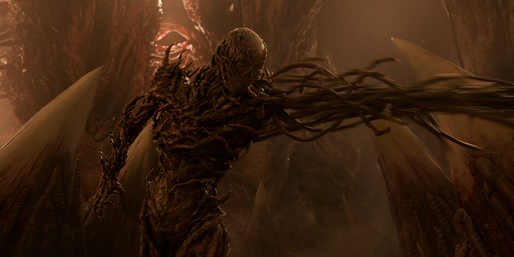 The approach adopted for Vecna is that he is actually causing the vines to grow, and that is how his arm extends.