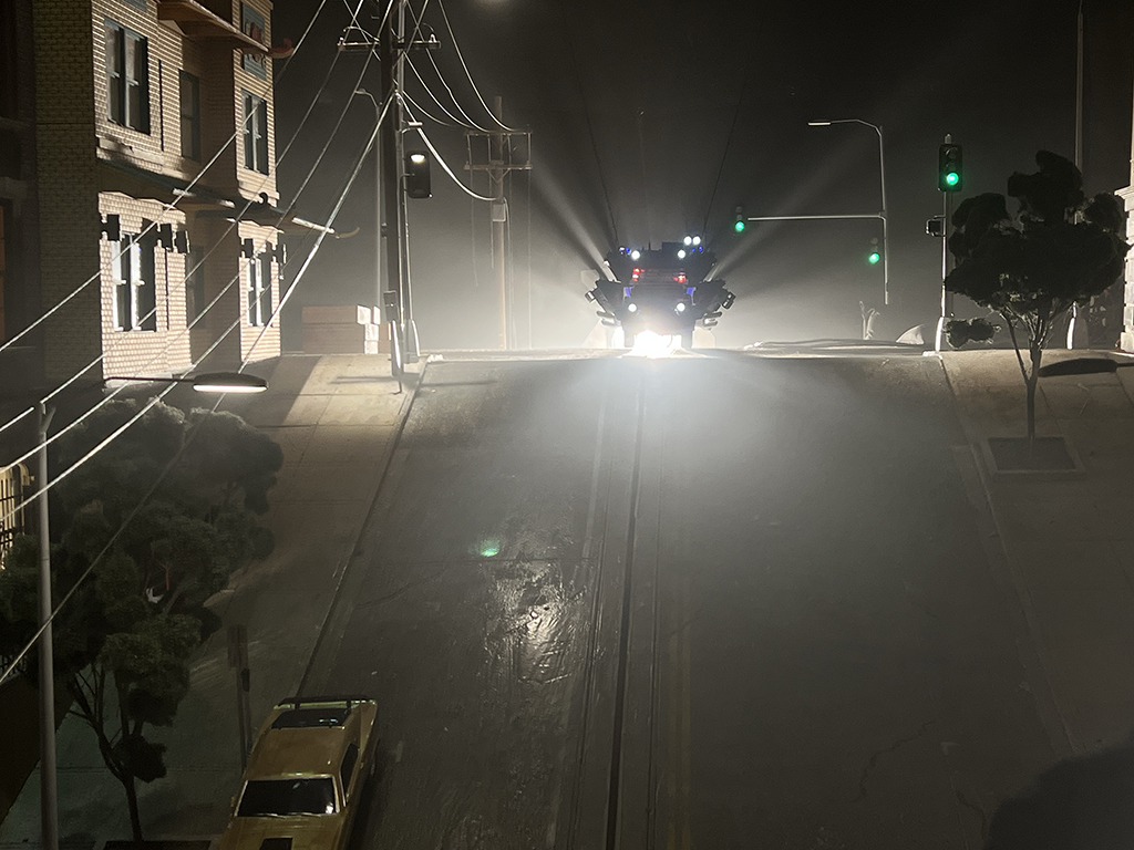 Warren synchronized a Nikon Z9 to a motion-control system, capturing separate passes for headlights, police lights and other interactive elements.