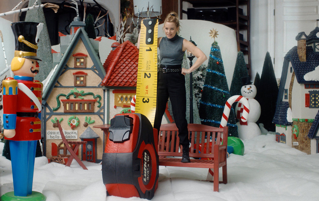 Oversized props were constructed by the art department, led by Maxwell Orgell, to give Elizabeth Banks something to interact with during her miniature scenes.