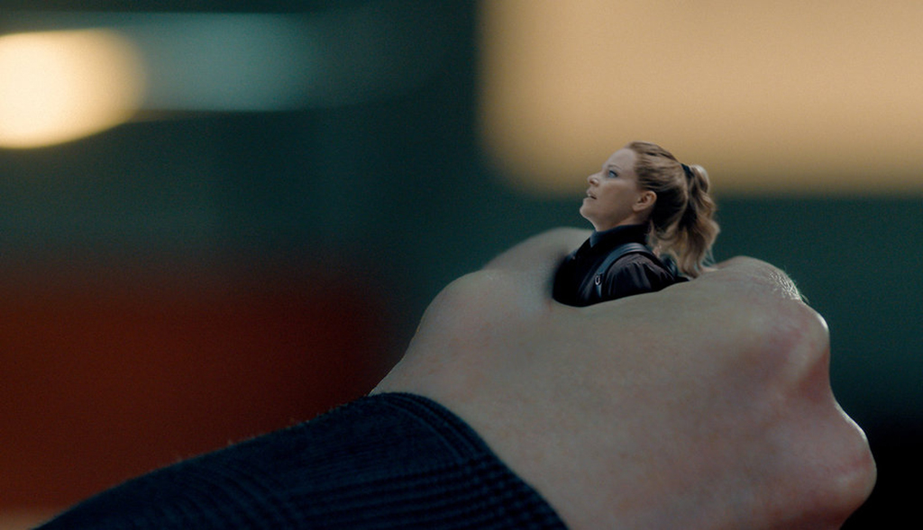 Among the hardest shots to execute are those in which miniature Lindy is held in human-sized hands.