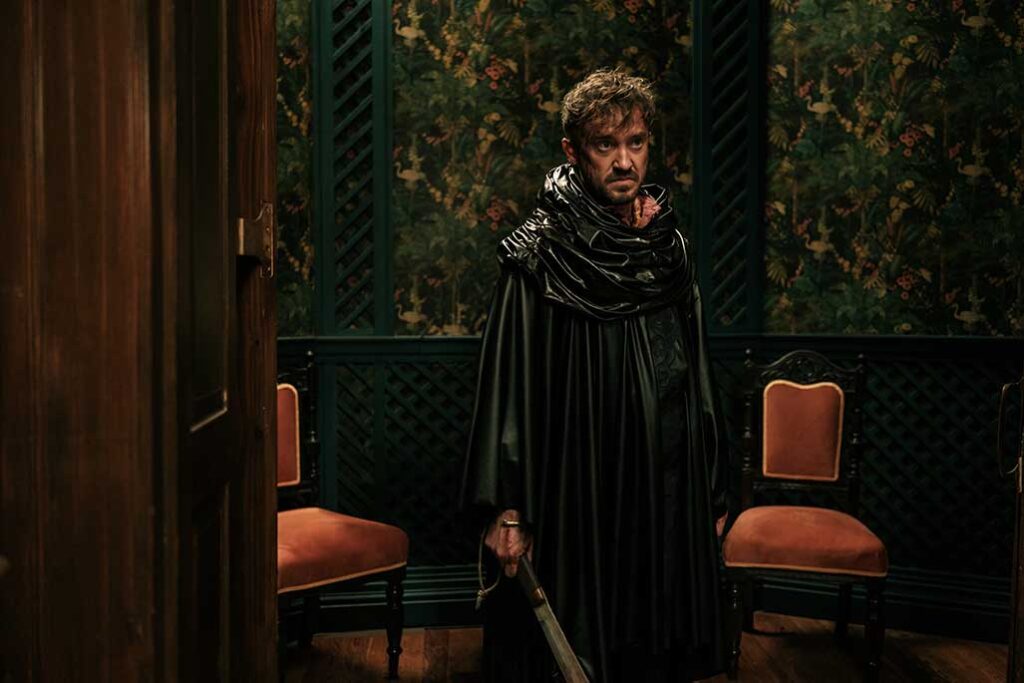 Literally getting beheaded and then later putting his severed head back on is Kevin (Tom Felton).