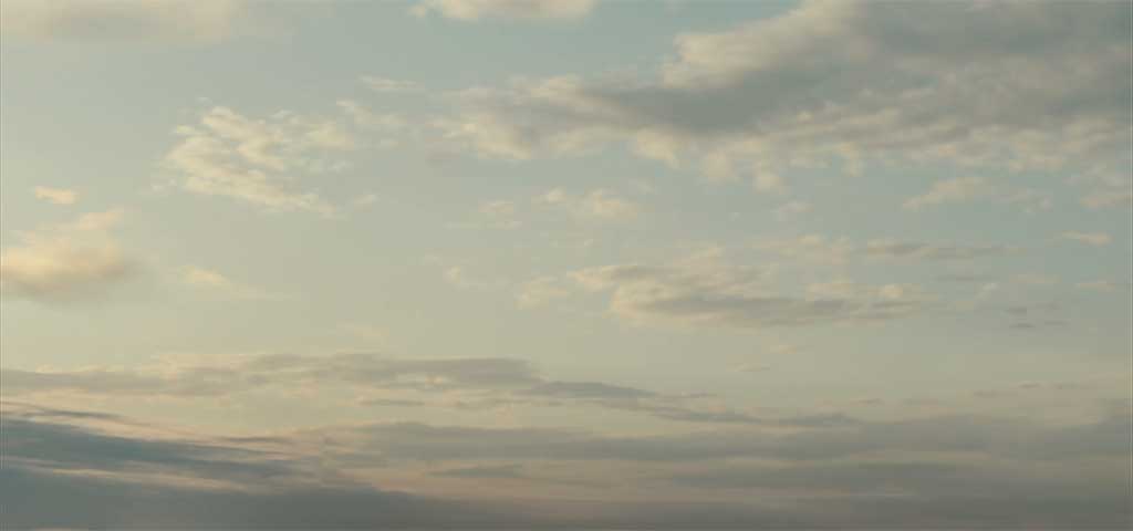 A DMP was created for the sky and mapped onto a sphere, and CG clouds and foreground mist were added, along with an entirely digital aircraft.