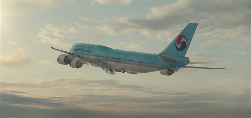 A DMP was created for the sky and mapped onto a sphere, and CG clouds and foreground mist were added, along with an entirely digital aircraft.