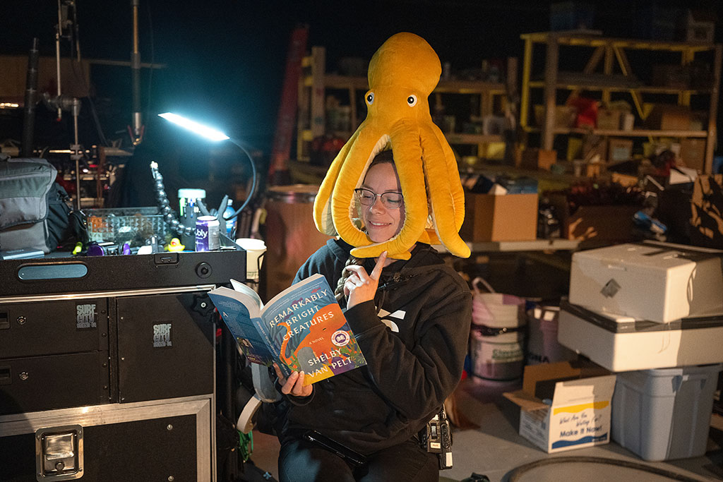 Production Sound Mixer Crystal McCracken takes a break to read Remarkably Bright Creatures by Shelby Van Pelt.