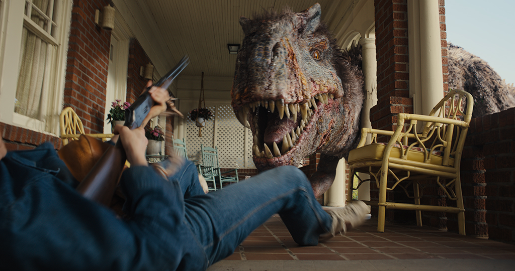 The enormous Allosaurus makes the front porch feel claustrophobic and dangerous.