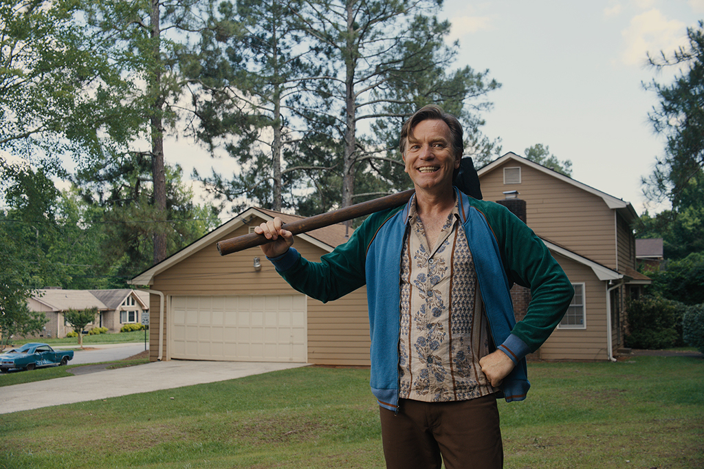 Actor Ewan McGregor, who plays Gregg Platt, stands in front of an unwanted visitor.