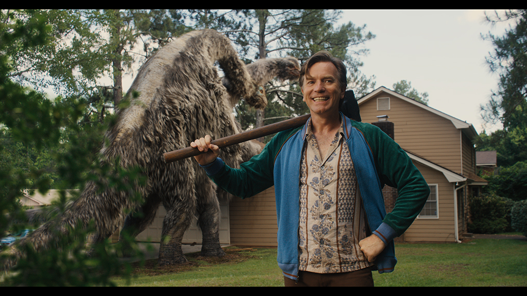 Actor Ewan McGregor, who plays Gregg Platt, stands in front of an unwanted visitor.