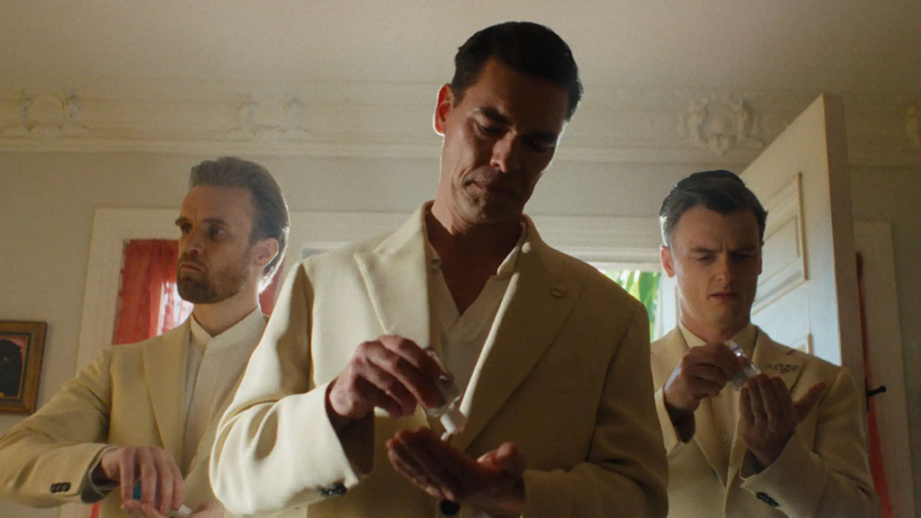 Molly and Frankie are pursued by impeccably dressed enforcers who want their experimental drugs back.